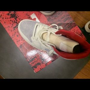 Slightly worn Nike Air Jordan 1 Mid past present future